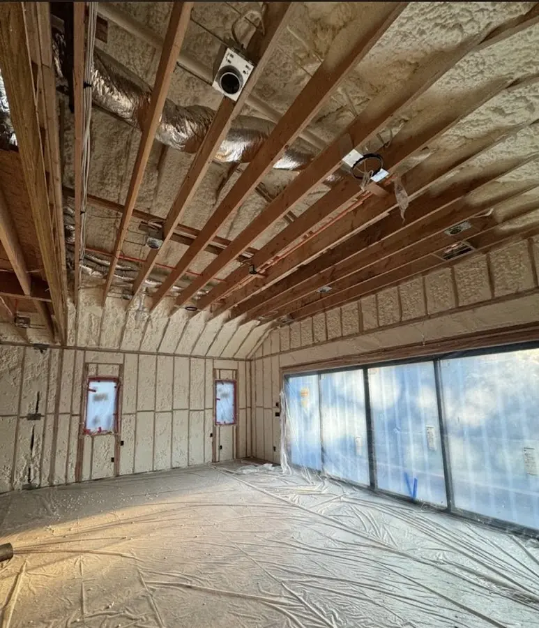 Interior walls and ceiling insulated with spray foam during new construction in Henderson